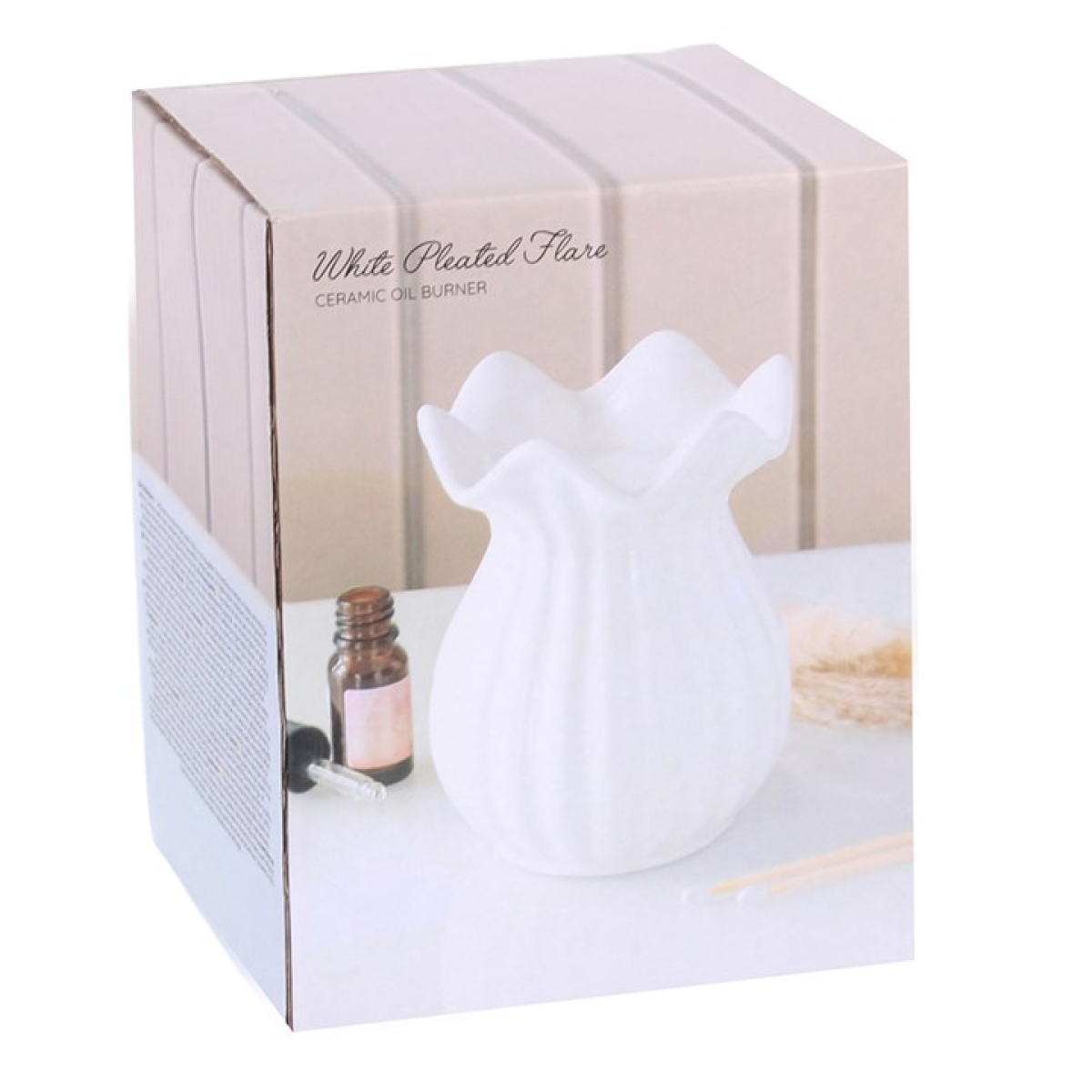 White pleated flare ceramic oil burner in a box with a bottle and other items.