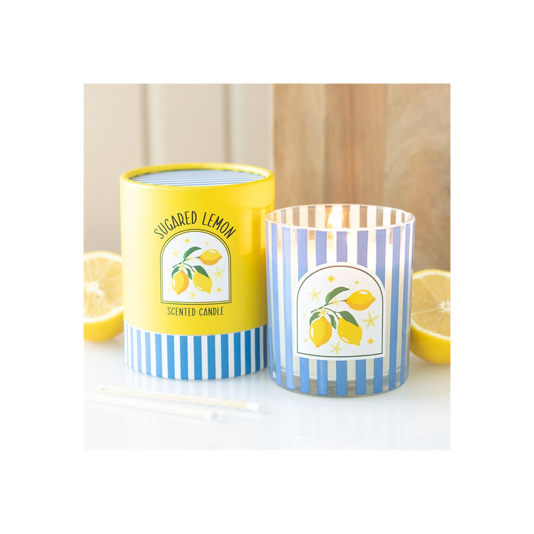 Sugared Lemon scented candles with striped containers on a white background