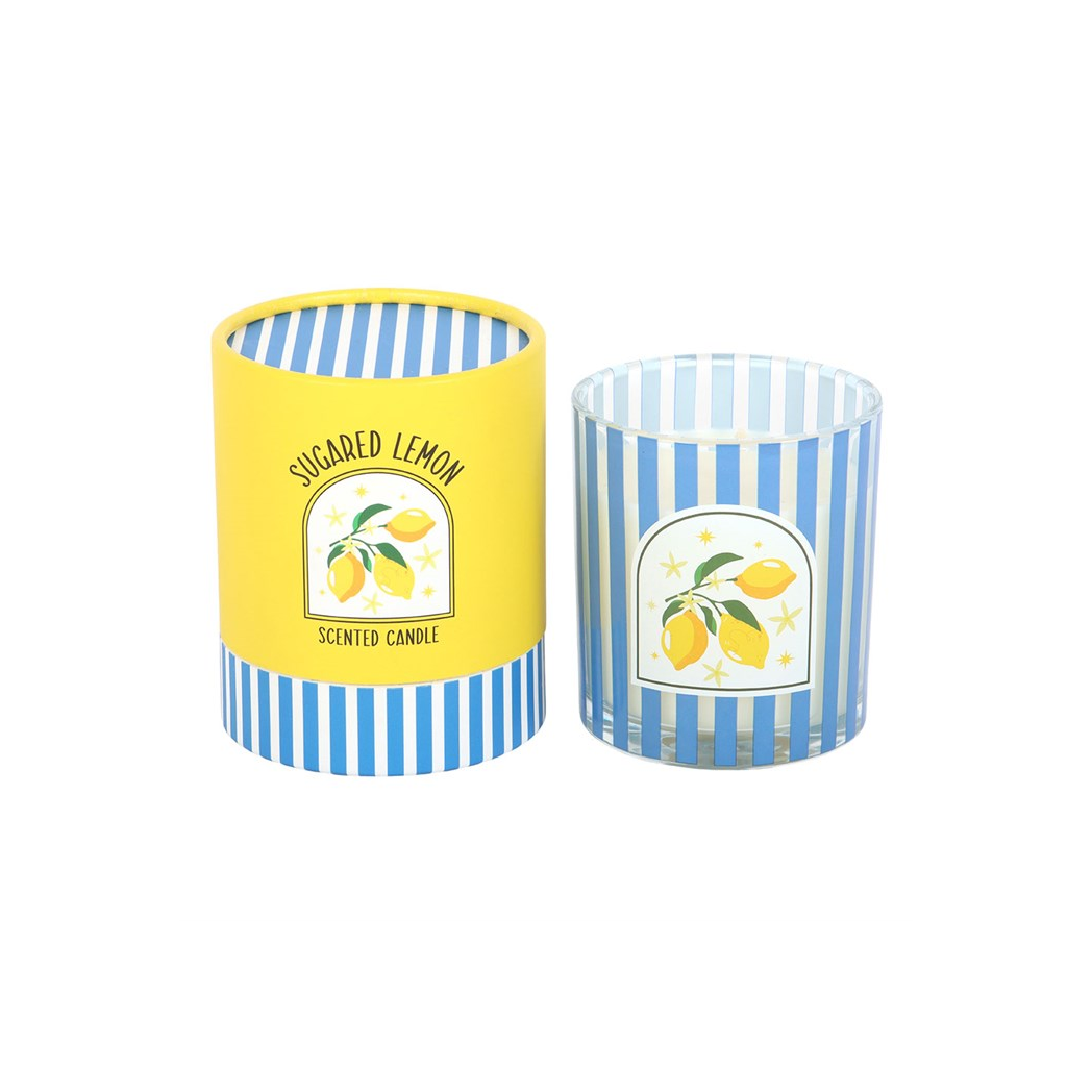 Two scented candles with striped yellow and blue containers on a white background