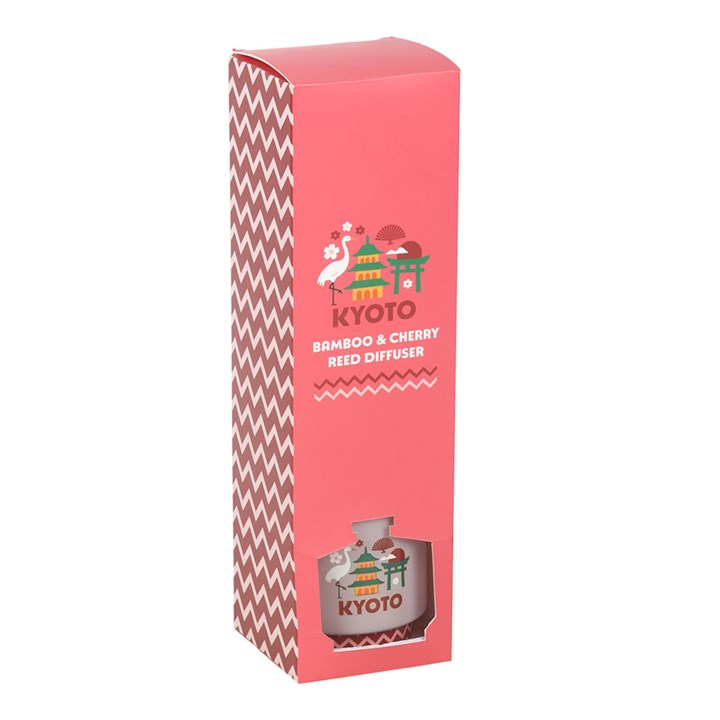 Pink packaging of a Kyoto bamboo & cherry reed diffuser with illustrations on a white background