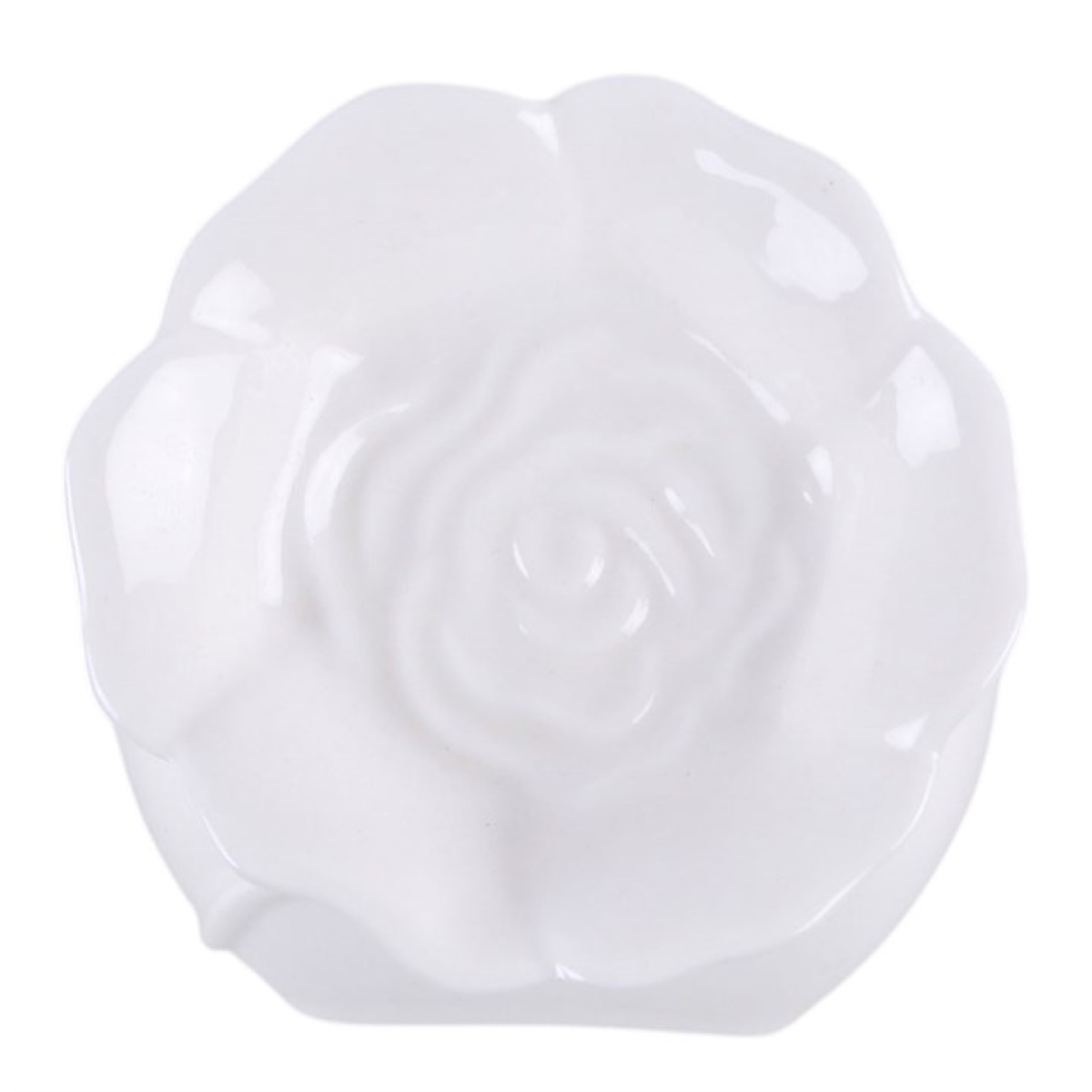 Top down view of the white rose oil burner on a white background