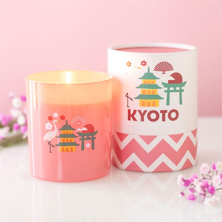 Candle with 'Kyoto' design on a pink background