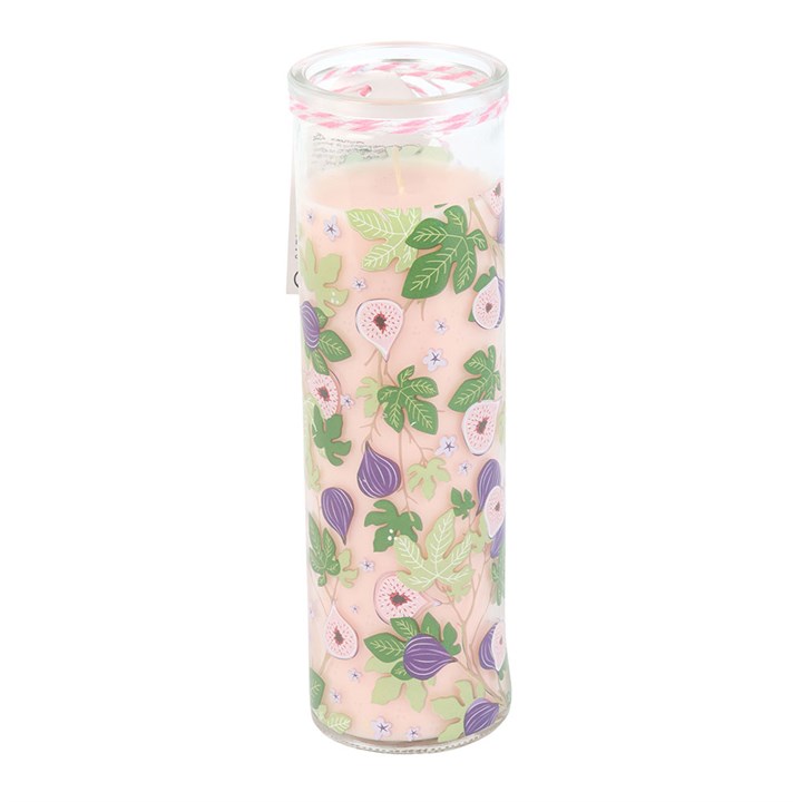 Candle in a glass container with floral design on a white background